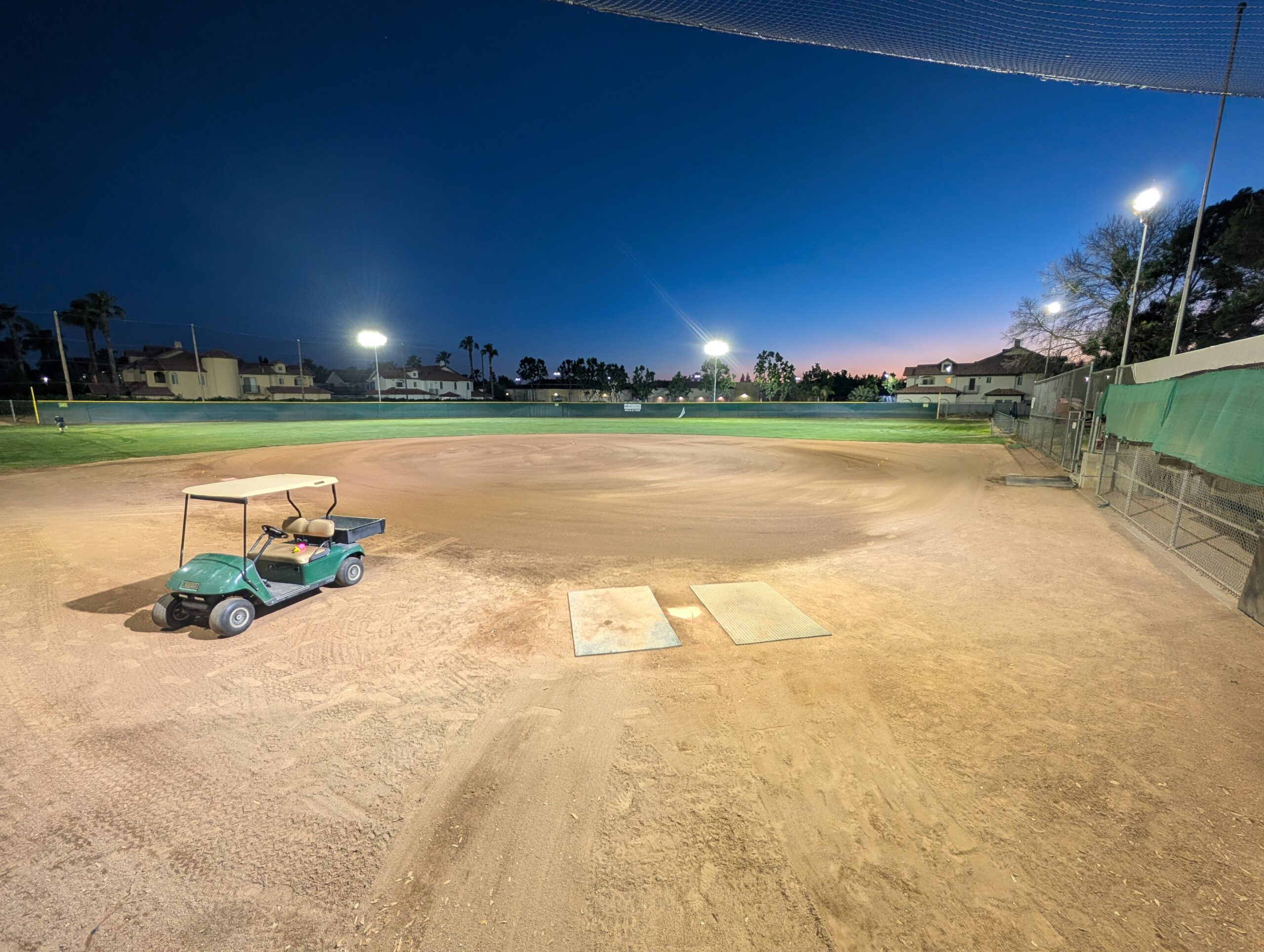 Home plate and catcher's area lit by LED sports lights — Bethany Church baseball field
